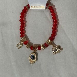 NWT. Unisex Cristal good luck bracelet